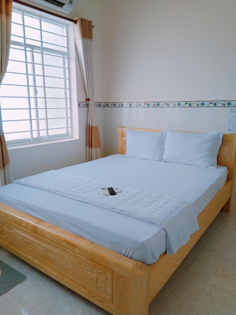 Nhà nghỉ Hạnh Minh Chi Khu Co Ong Exterior foto